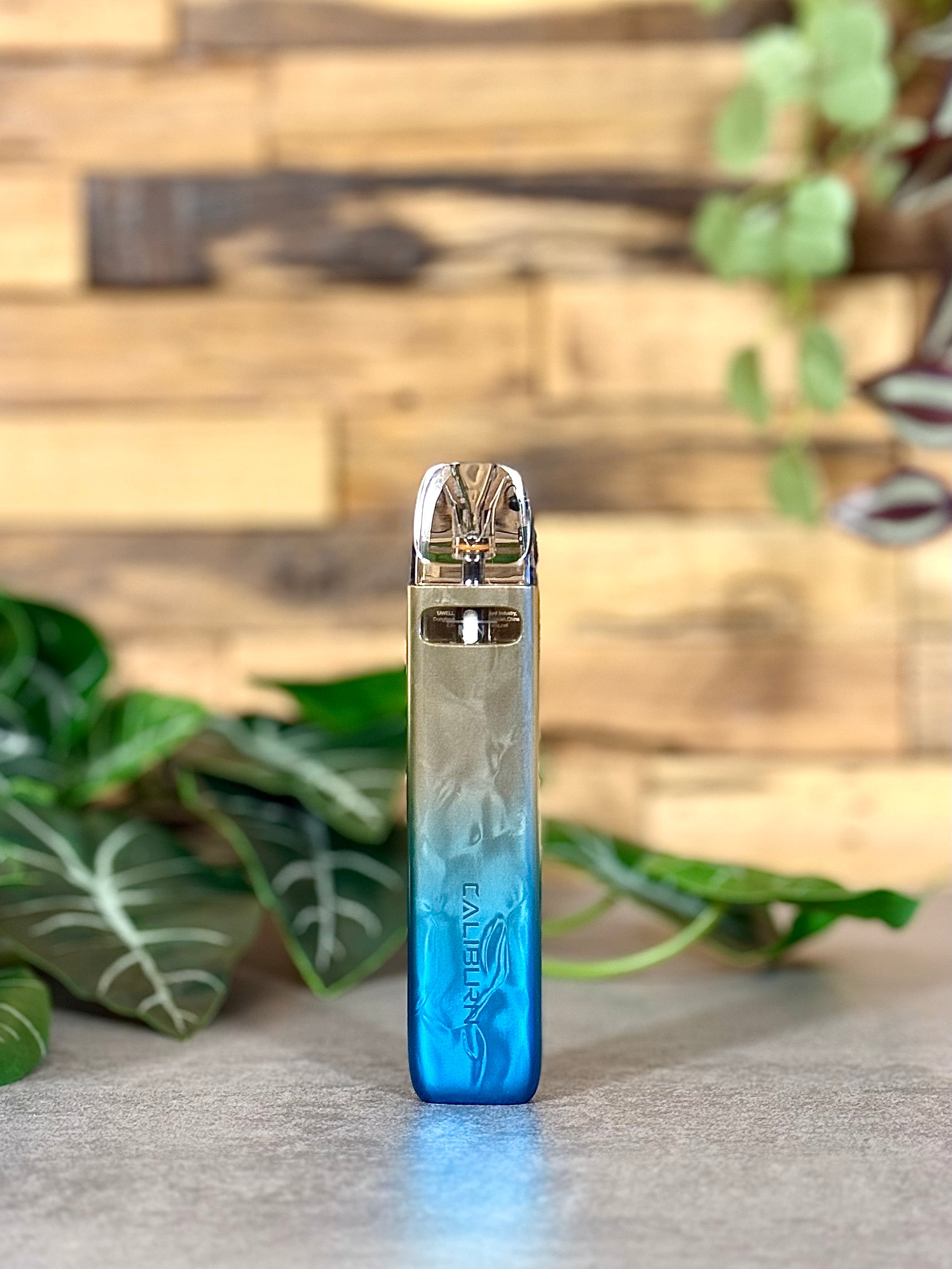 Die Uwell Caliburn G4 Mini | Blau-Gold - klar wie der Himmel, strahlend wie dein Sieg.