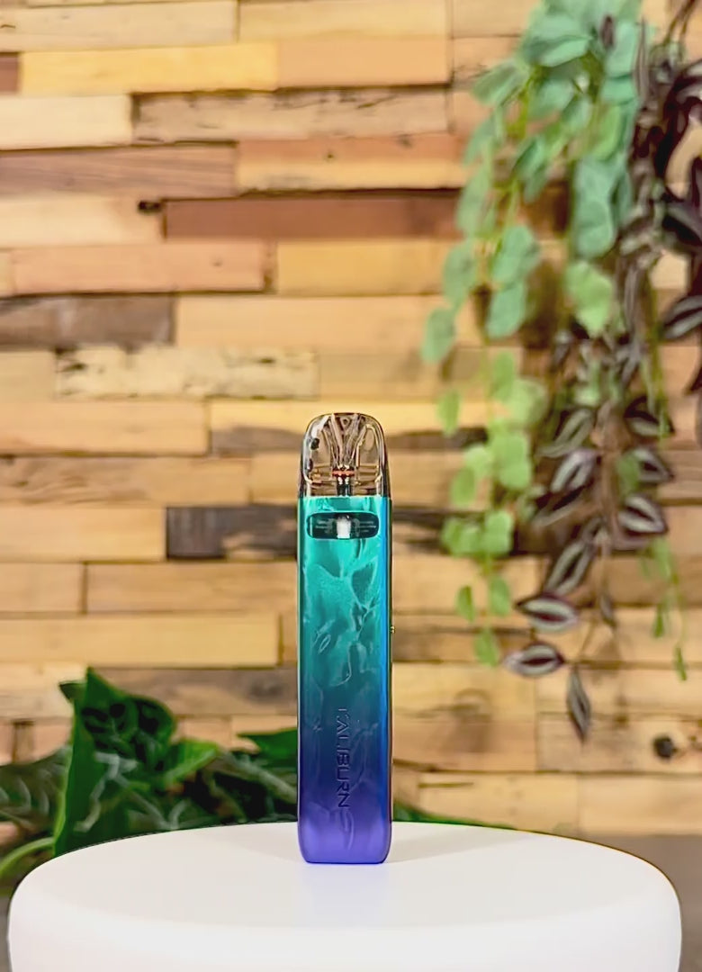 Die Uwell Caliburn G4 Mini | Türkis-Lila - dein bunter Cut mit dem grauen Tabak-Alltag.