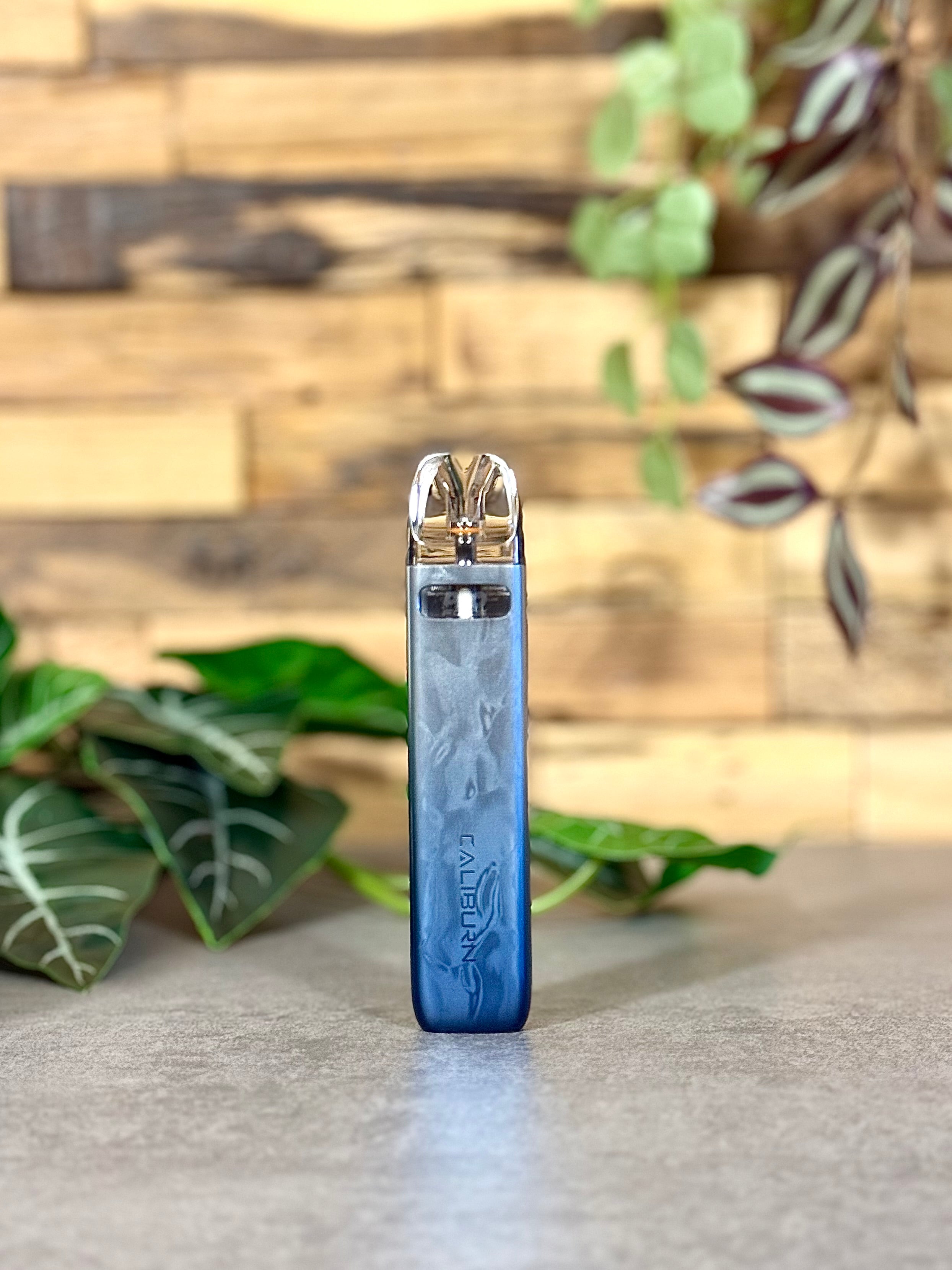 Die Uwell Caliburn G4 Mini | Blau Silber - wie ein klarer Morgen ohne Tabak.
